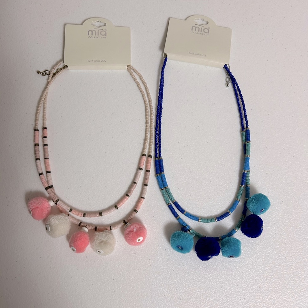 NWT 2 Pom Pom necklaces Pink and Blue 19 inches length